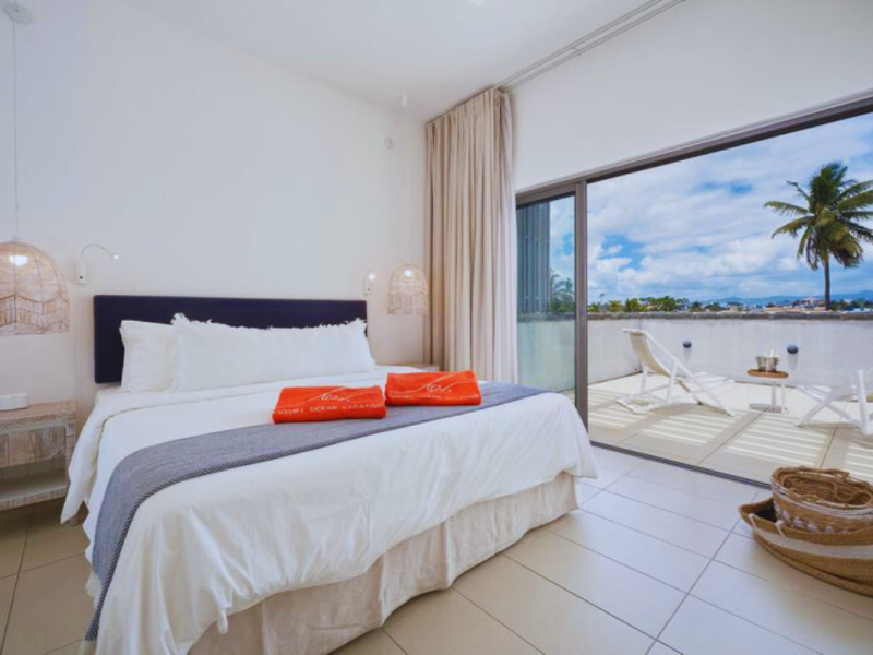 Les Estivales Beachfront Penthouses bed